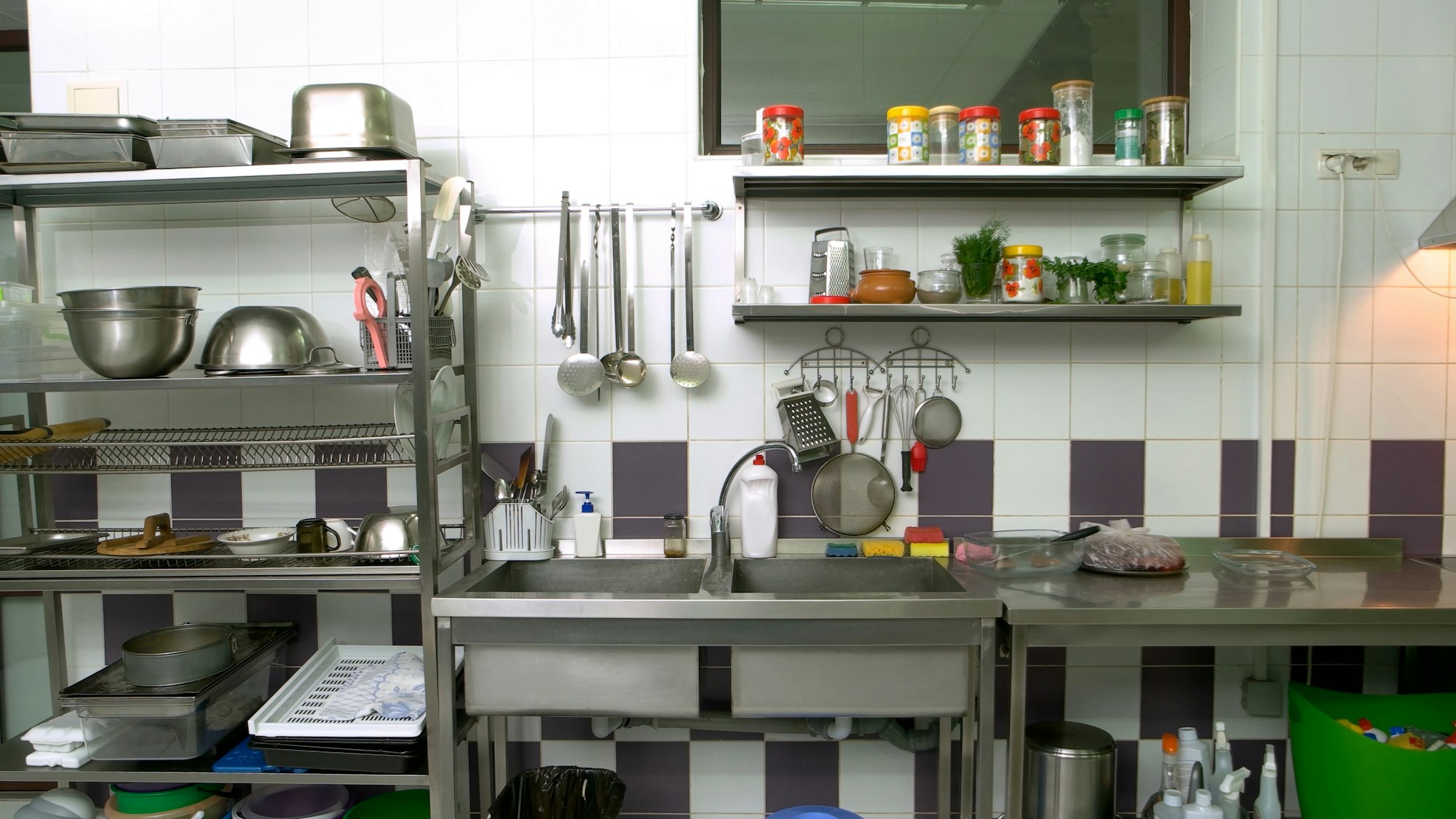 Various utensils at commercial kitchen.